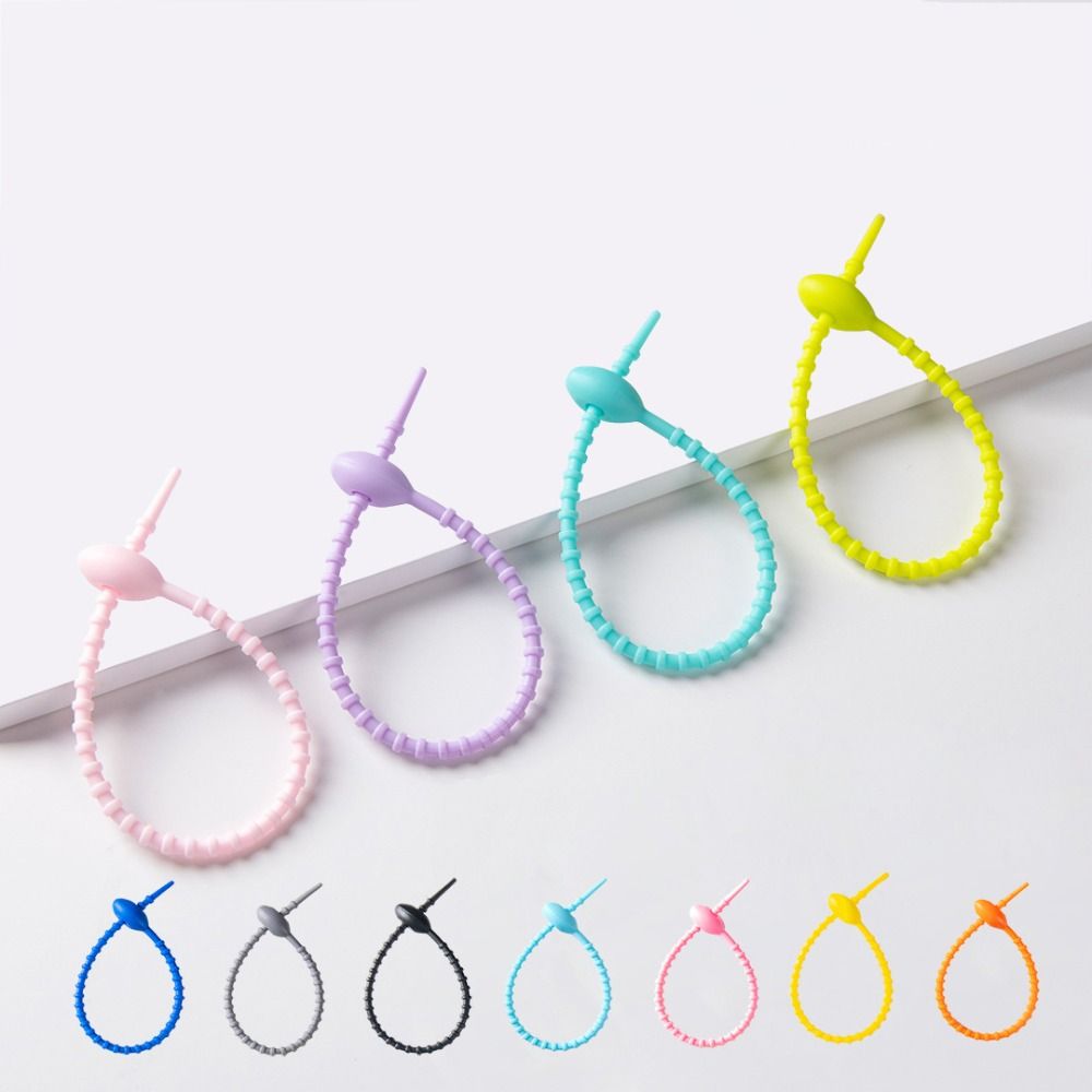 Tadpole型ケーブルワインダー、シリコンリボン、イヤホン - Cable Winder Keychain のレビューと価格