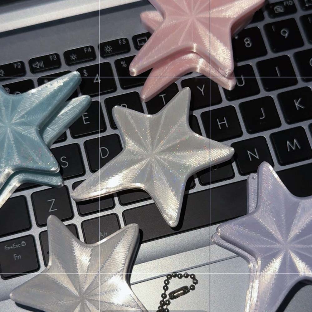 Y2Kスタイル3Dスターケーブルホルダー、ポータブルイヤホン - Cable Winder Keychain のレビューと価格